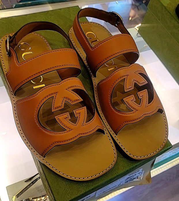 Brown Gucci sandals